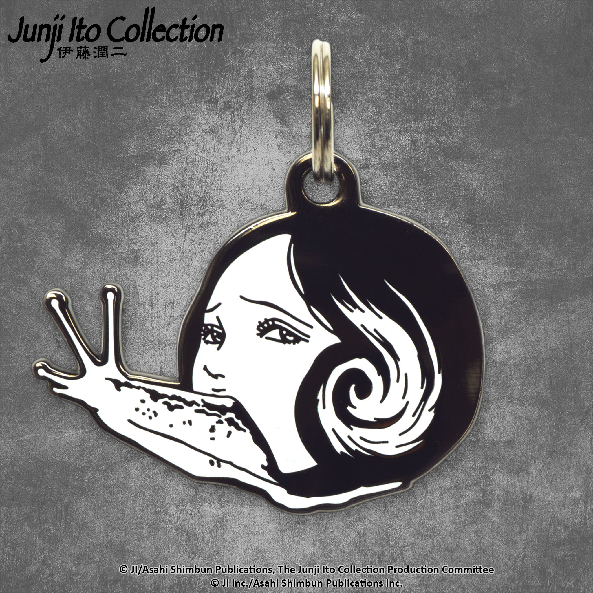 A pet tag featuring Slug Girl, a grotesque character from Junji Ito's manga, with her eerie appearance and slimy body.