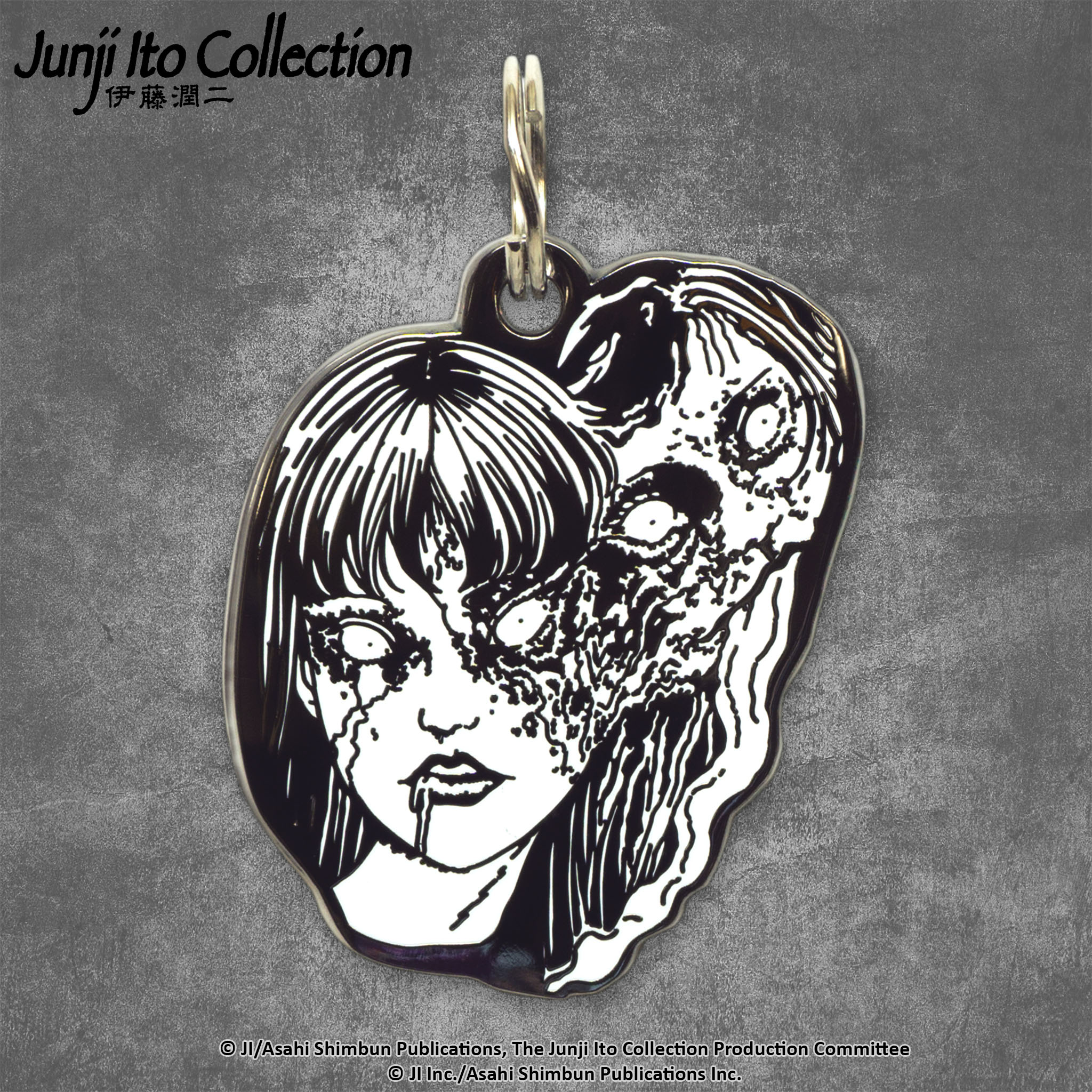 A pet tag featuring Tomie, a captivating yet terrifying character from Junji Ito's manga, known for her alluring beauty and supernatural ability to regenerate.