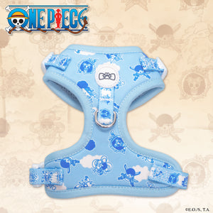 Flat lay of the One Piece New World Harness featuring Straw Hat Jolly Roger symbols on black fabric with red trim and adjustable straps.