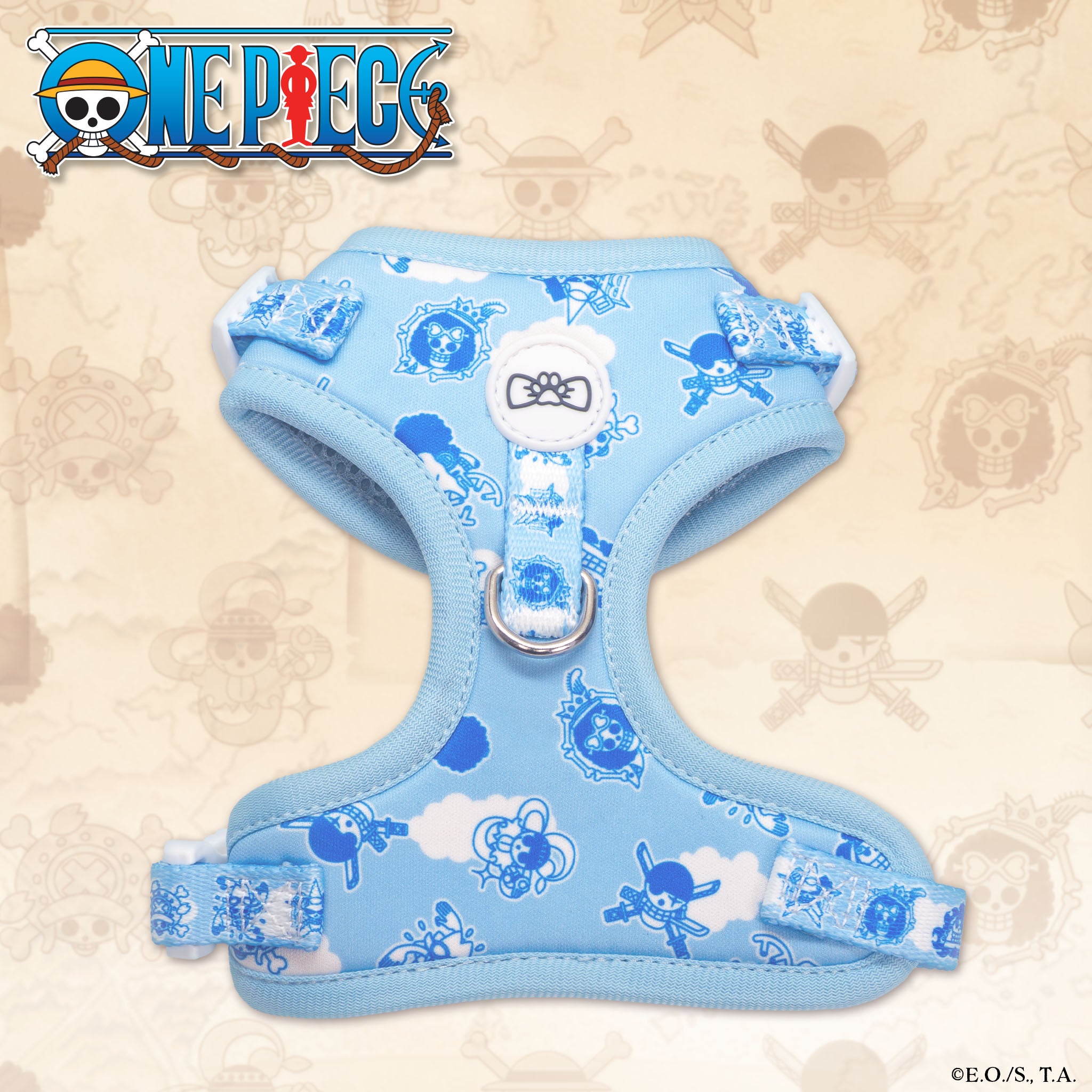 Flat lay of the One Piece New World Harness featuring Straw Hat Jolly Roger symbols on black fabric with red trim and adjustable straps.