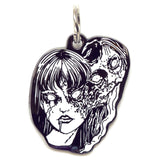  A pet tag featuring Tomie, a captivating yet terrifying character from Junji Ito's manga, known for her alluring beauty and supernatural ability to regenerate.